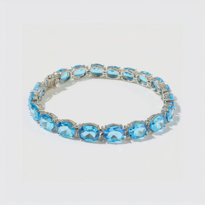 Blue Topaz Sterling Silver Tennis Bracelet – Clarity & Confidence