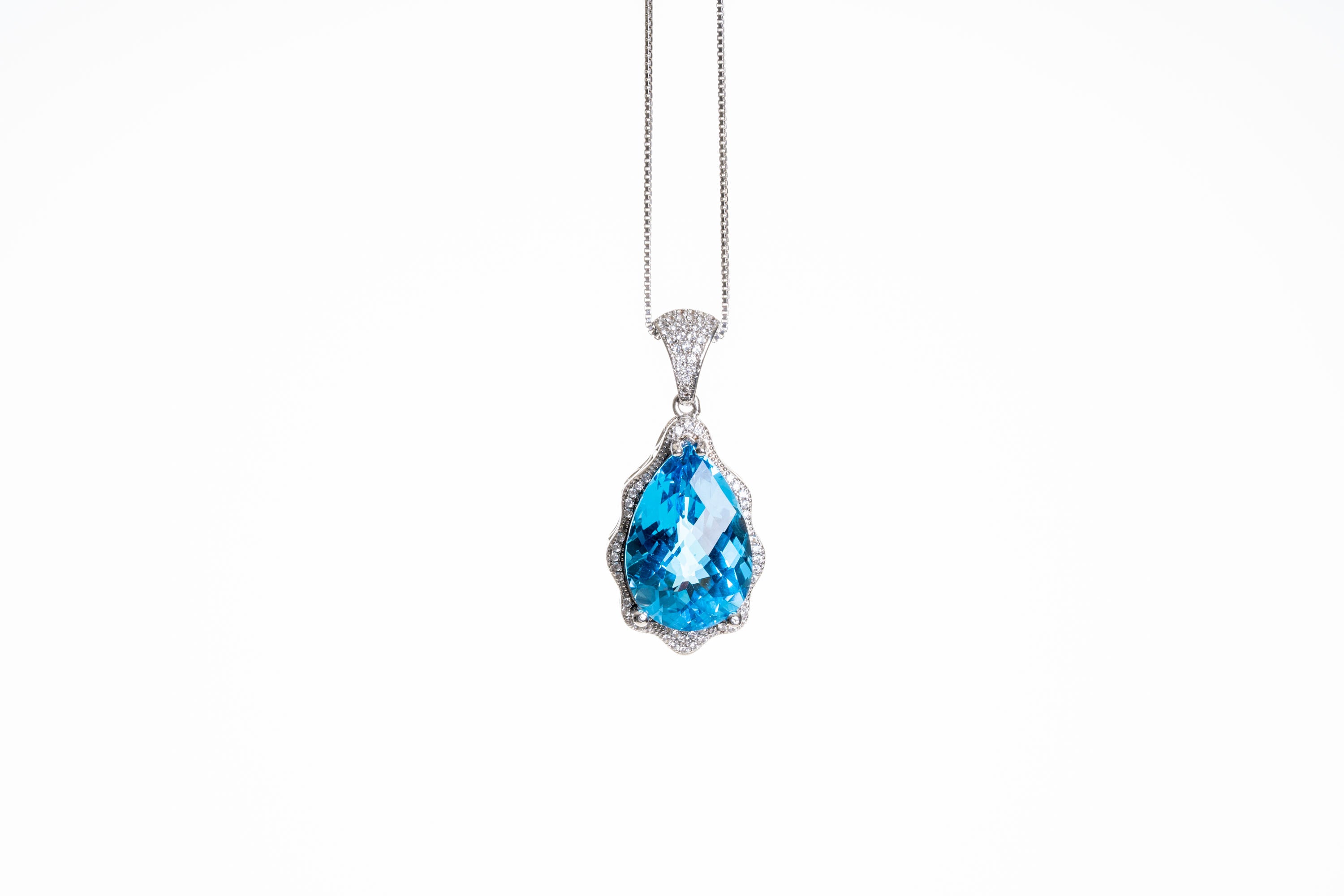 Blue Topaz Faceted Sterling Silver Pendant.