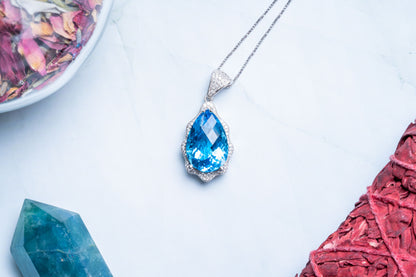 Blue Topaz Faceted Sterling Silver Pendant.